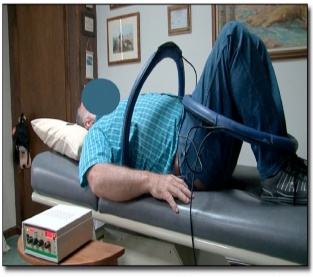 A person sitting in a chair

Description automatically generated