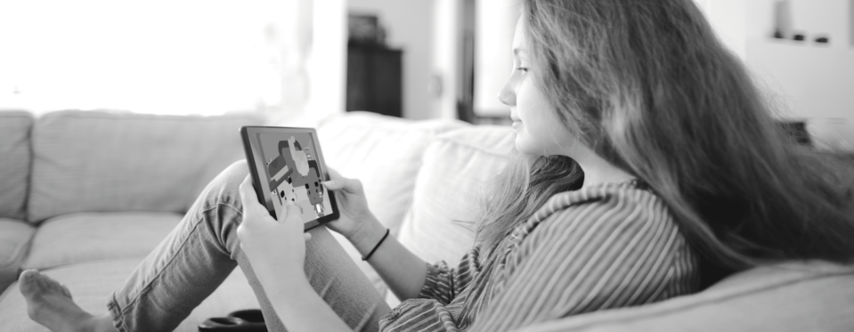 Student playing on a tablet