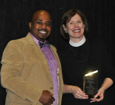 Lucinda Laird receives Lillian Yeager award from Arthur Cox