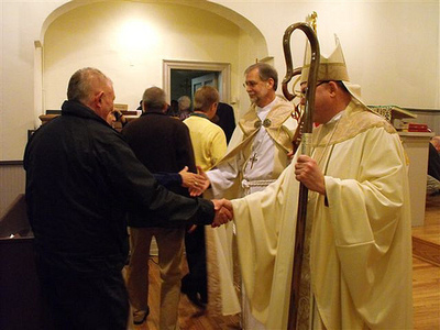 Bishop White and Bishop Gafkjen greet congregation members after Christ Church service