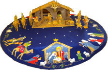 view of a family creche with hand decorated cloth
