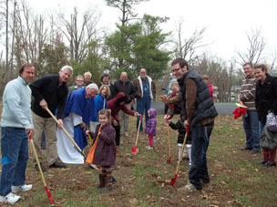 St Peter's members and priest break ground for labyrinth
