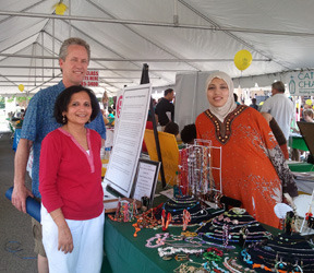 Mayor visits refugees with Beaded Treasures Project at festival