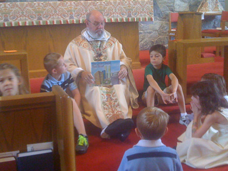 Ft. Stephen reads to children