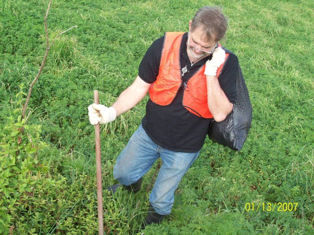 Volunteers cleaning up litter along Tomstown Road