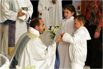 1st Communion at Baptism