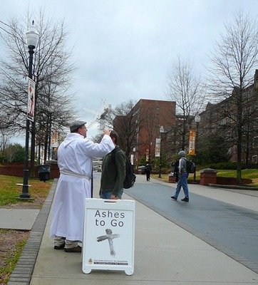 A student at the University of Tennessee, Knoxville, receives ashes from Bishop Young on Ash Wednesday 2013