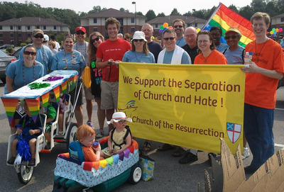 Several parishes marching together at the Heartland Pride parade