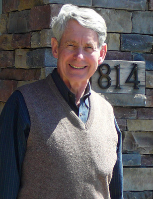 Episcopal Diocese of East Tennessee Treasurer Ron Moore poses for a picture in front of the Diocesan House in Knoxville
