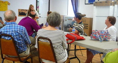 AMRT pilgrims receive information about Appalachian Habitat for Humanity with Resource Development Manager Haley Cross Terry