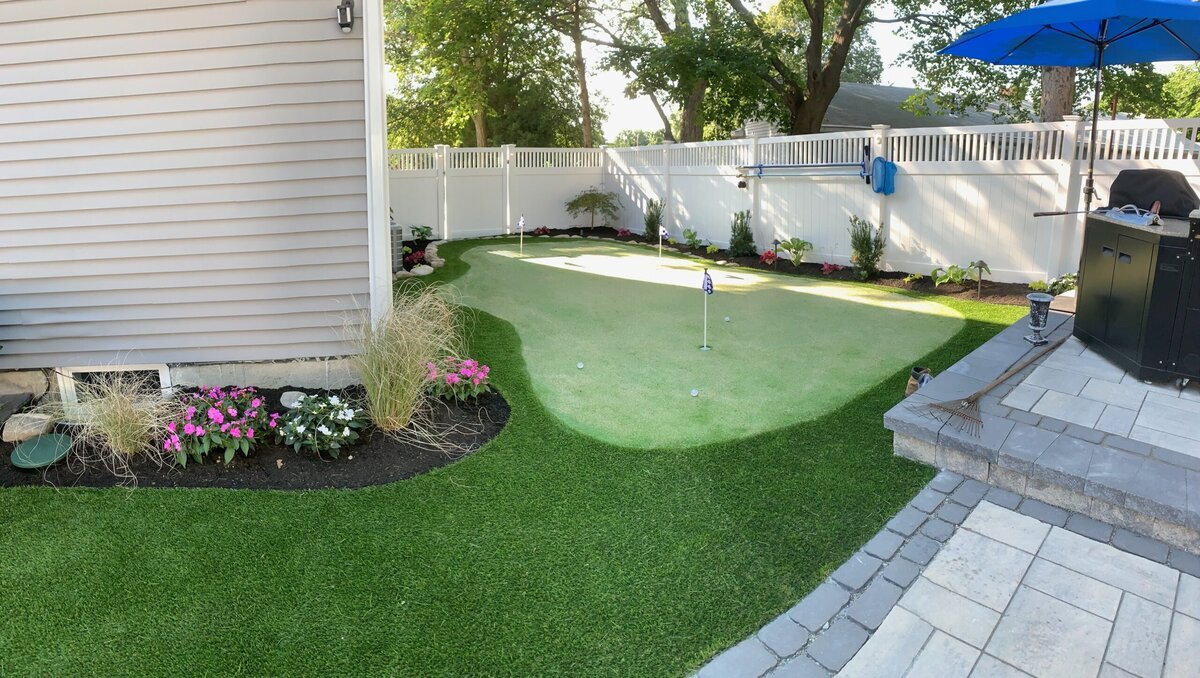 Backyard putting green with lawn Boston