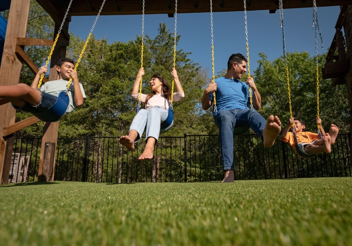 Artificial turf backyard swing