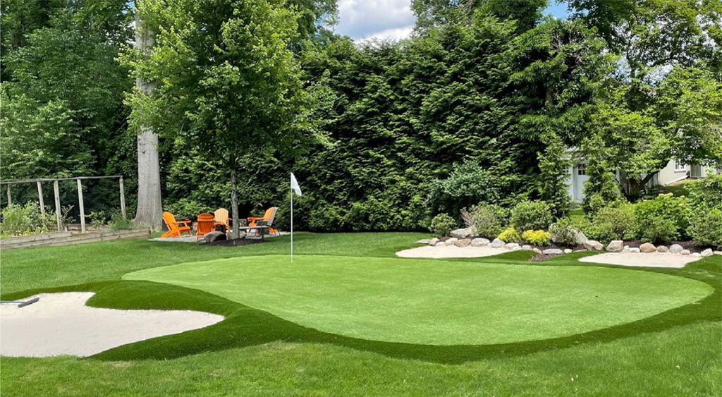 Boston backyard putting green with multiple bunkers and fringe