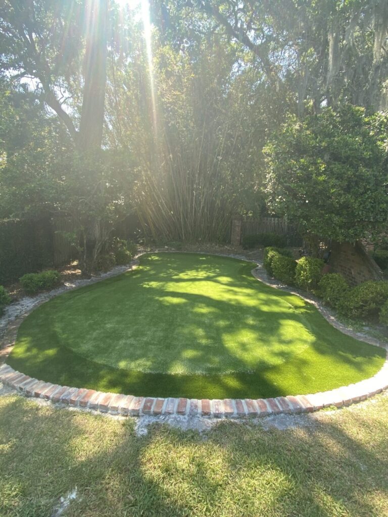 backyard putting green with brick border