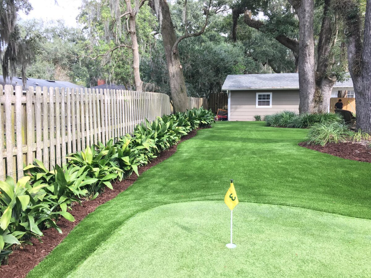 chipping view of jacksonville backyard putting green