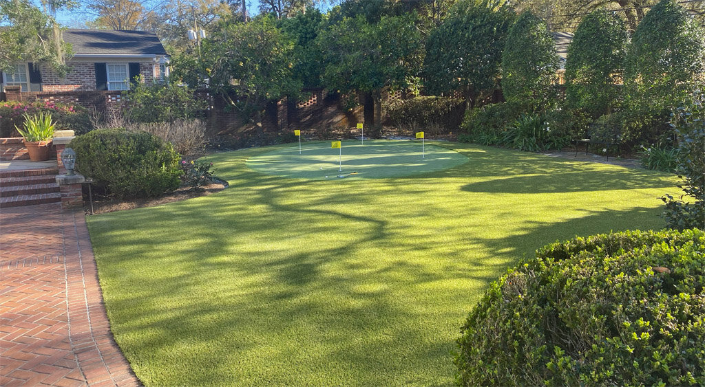 fake grass backyard jacksonville with putting green