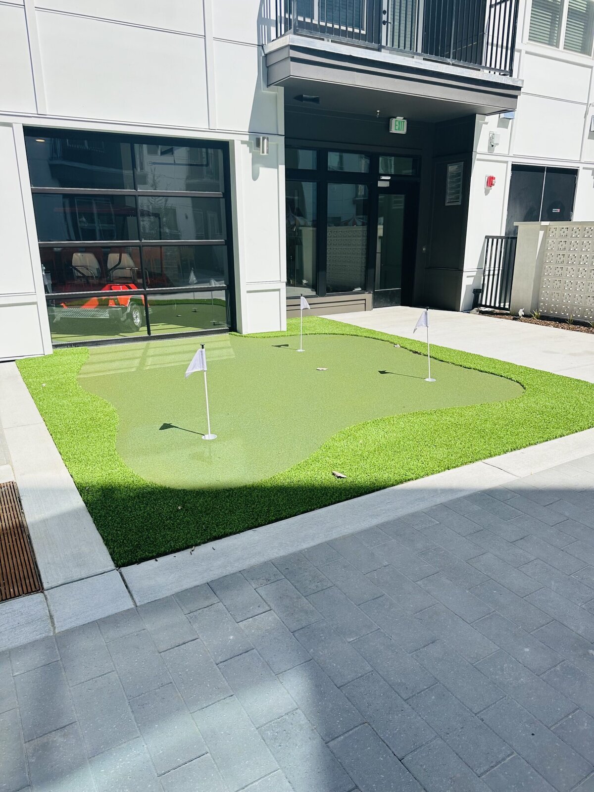 Putting Green Outside Golf Cart Show Room