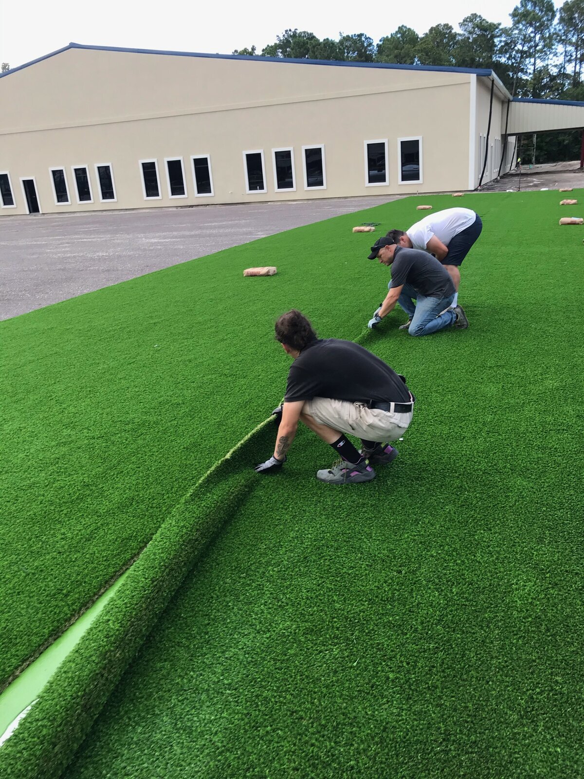 Rolling Turf Onto Seam Tape