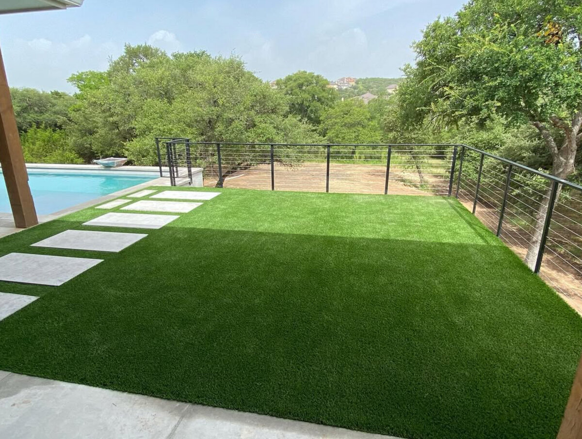 Backyard Artificial Grass Raised Patio Next to Pool