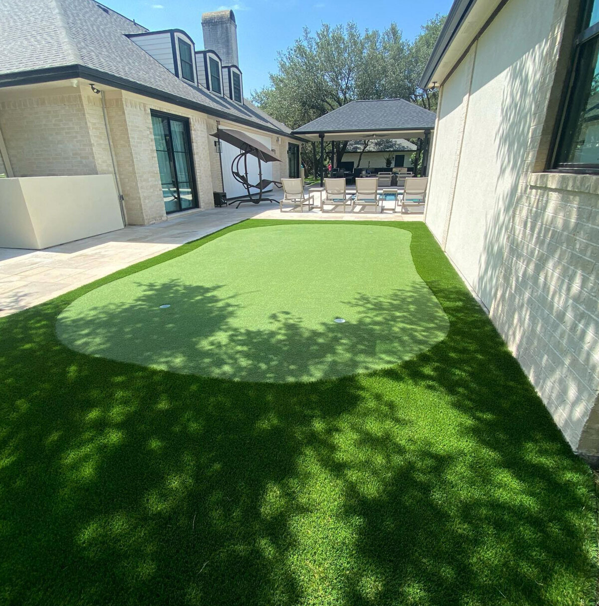 Putting Green Between House and Pool Austin