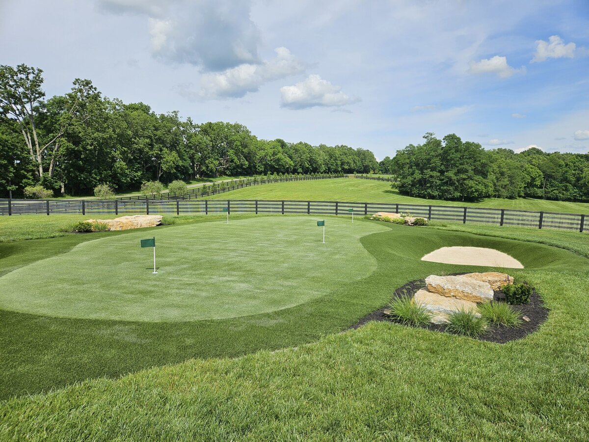 Golf Green With Bunker In Backyard