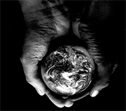 Logo for interfaith earth care conference, shows hand holding the earth