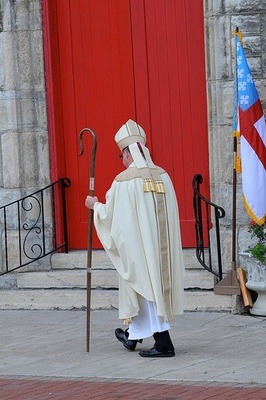 Bishop White approaches cathedral door