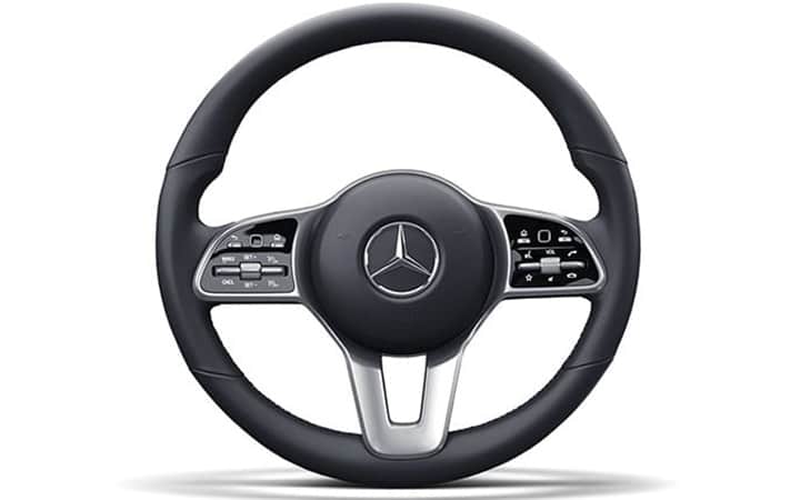 Hands on the wheel, thumbs on the world.