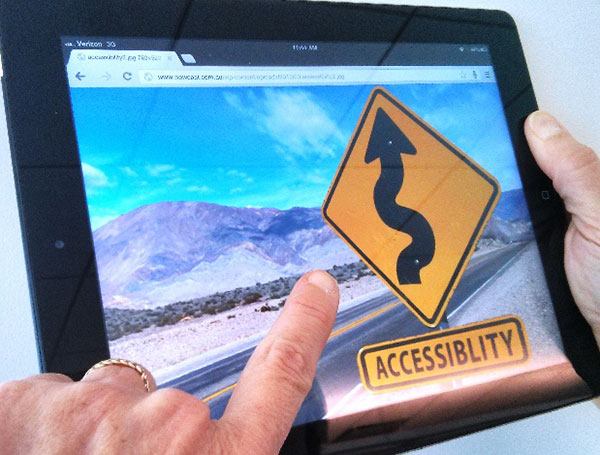 An accessibility road sign displayed on an iPad.