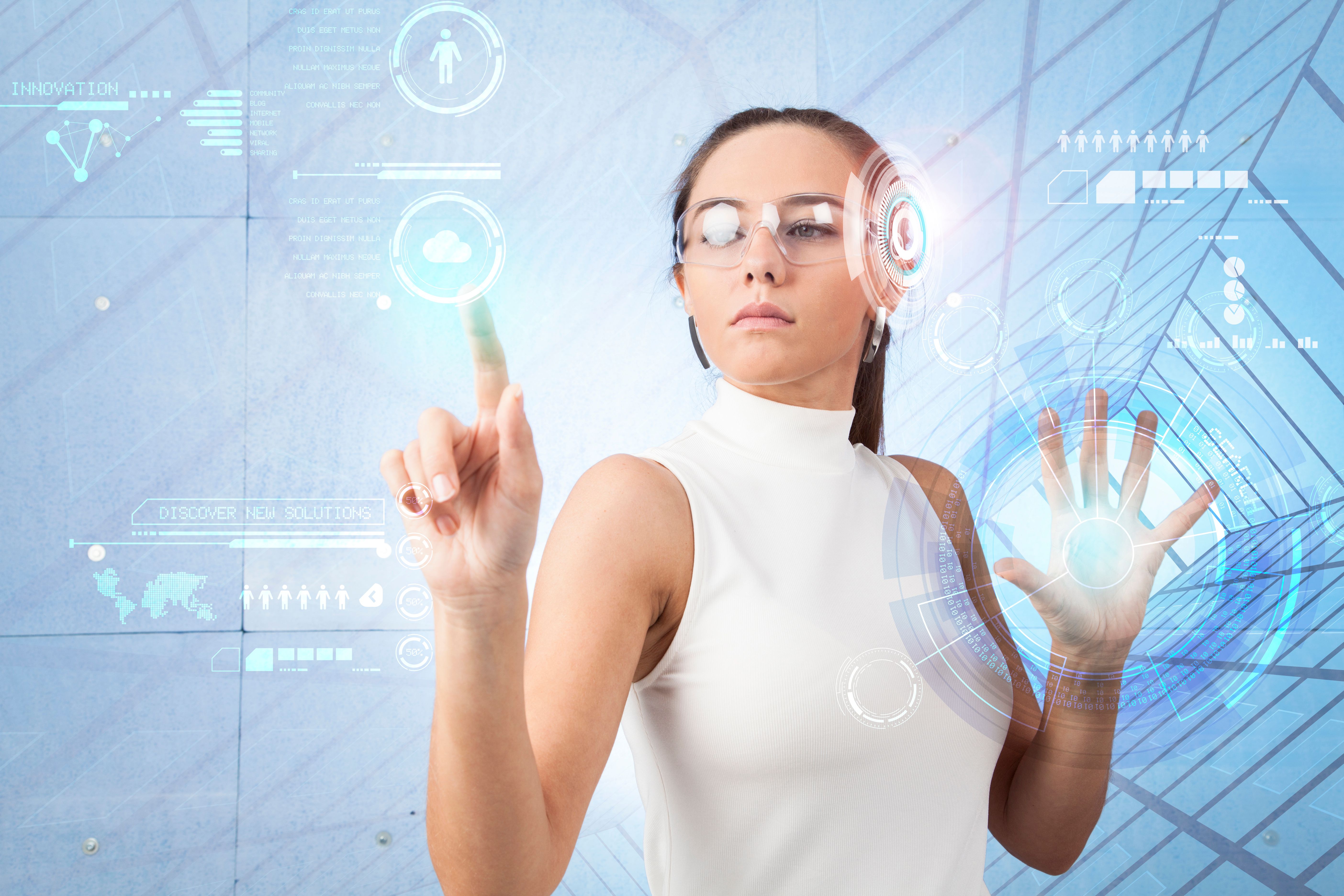 Woman touching a virtual interface.