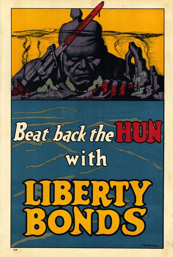 A World War I poster reads, Beat back the Hun with Liberty Bonds.
