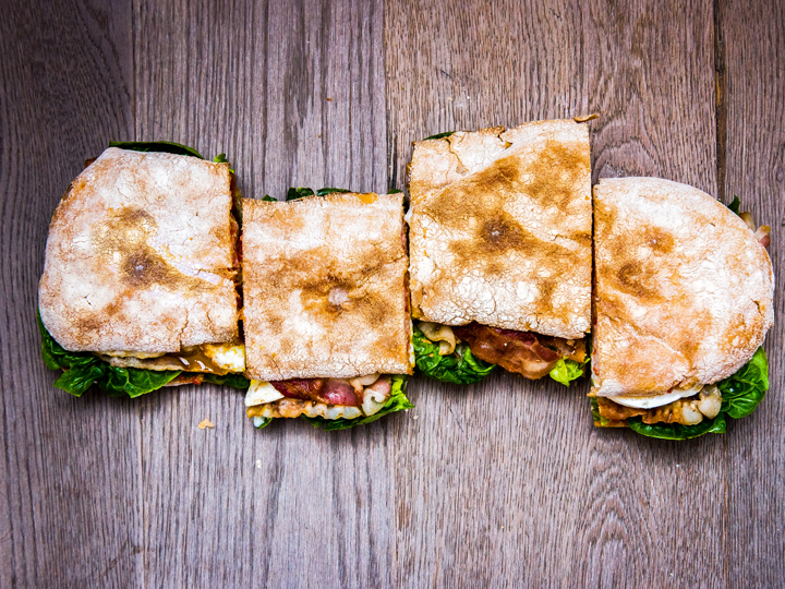 4 sandwich slices with thin bread, bacon, lettuce and other ingredients