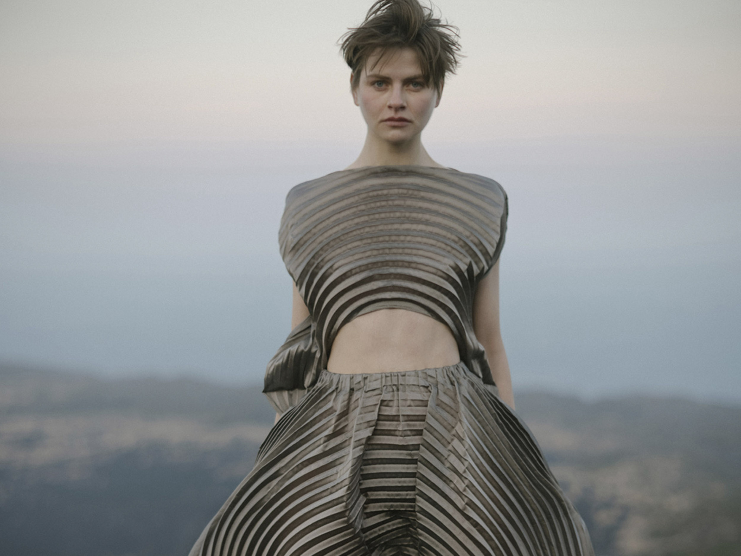 Issey Miyake strikes a sophisticated balance between organic beauty and futuristic utility