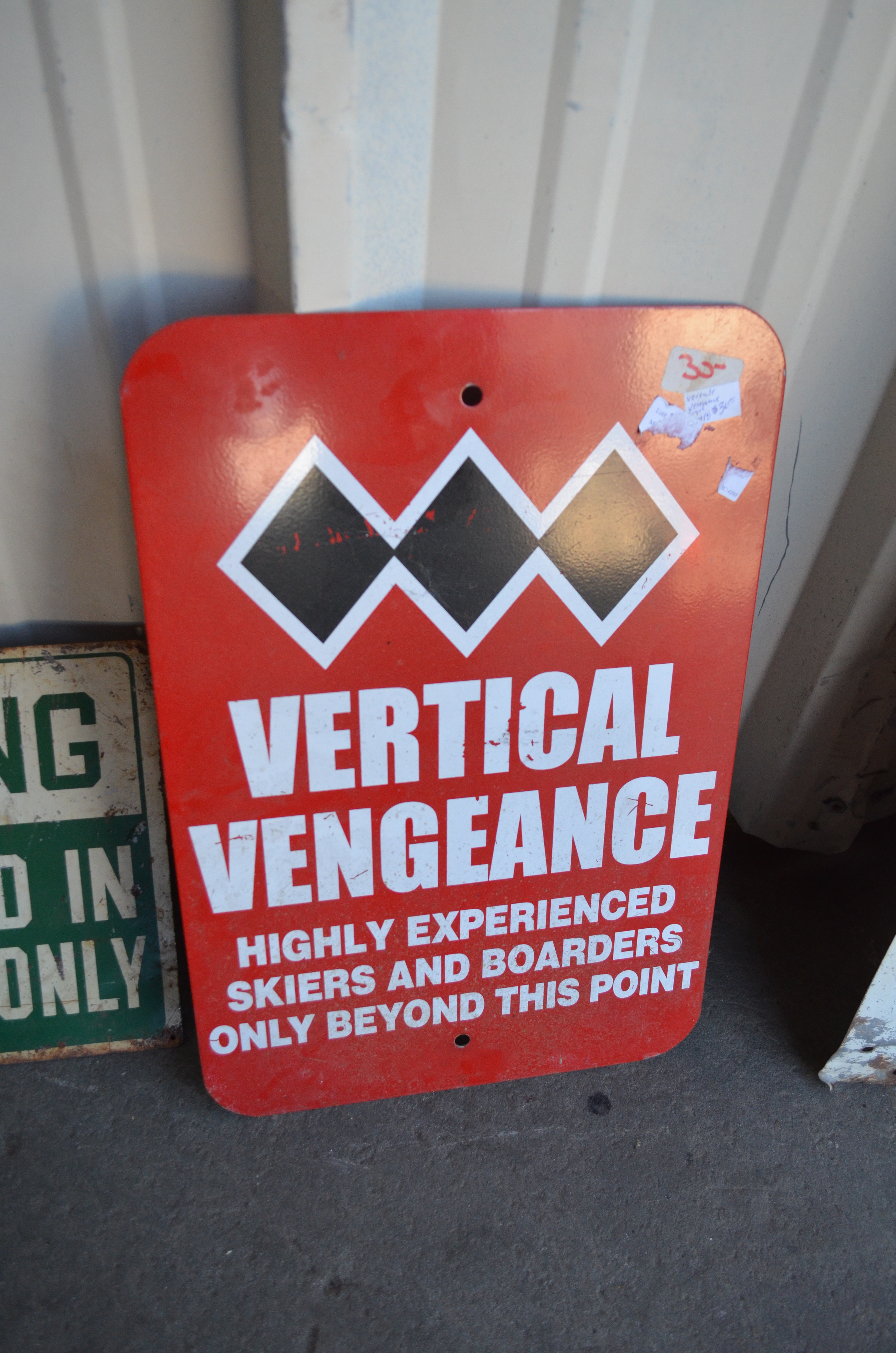 "Vertical Vengeance" Distressed Outdoor Metal Sign