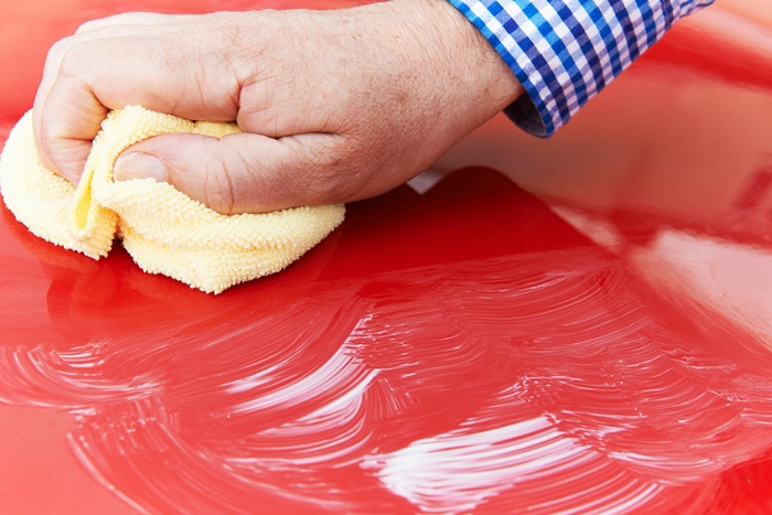 Washing a car as part of car body maintenance