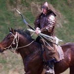 Horseback archery competition in the valley