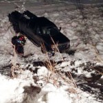 One hurt as truck goes down embankment
