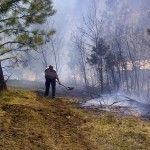 Fire fighters and RCMP bring fire under control
