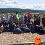 Grade 8s fill 40 garbage bags full of weeds