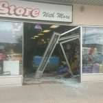 Vehicle plunges into store