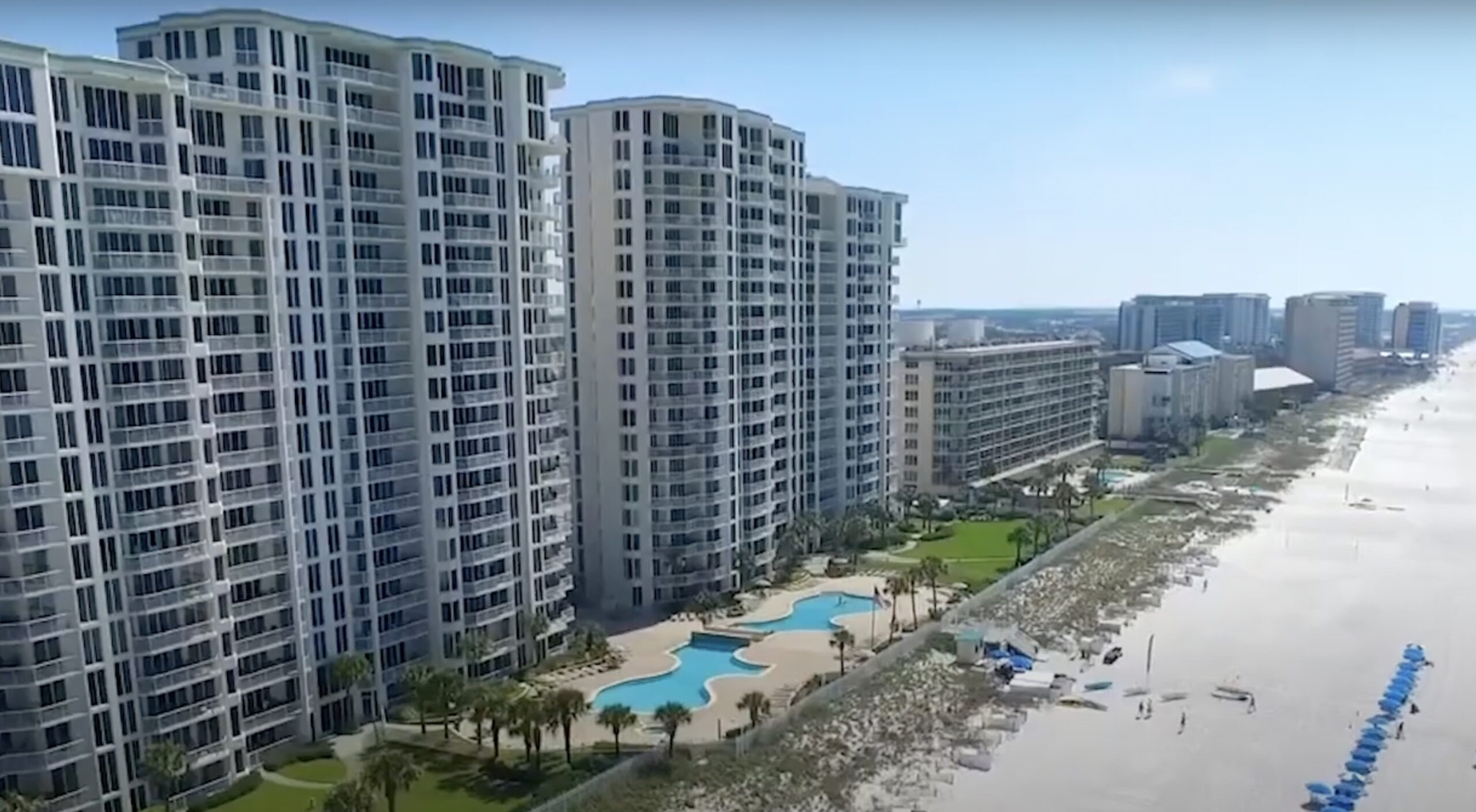 to Silver Beach Towers Wooley Luxury Properties LLC Wooley