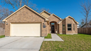 A Single-Story Brick Home with a Car Garage in Highland Acre Homes, Houston Texas