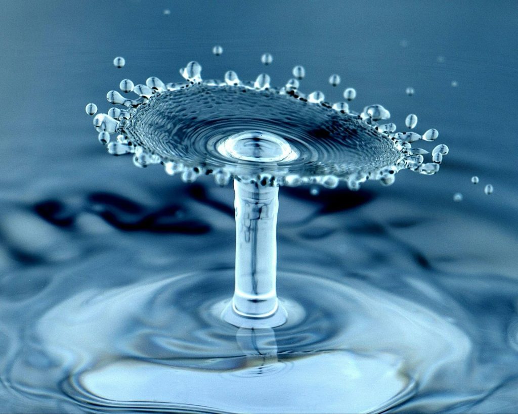 a water droplet impact forming a stunning crown-like splash.