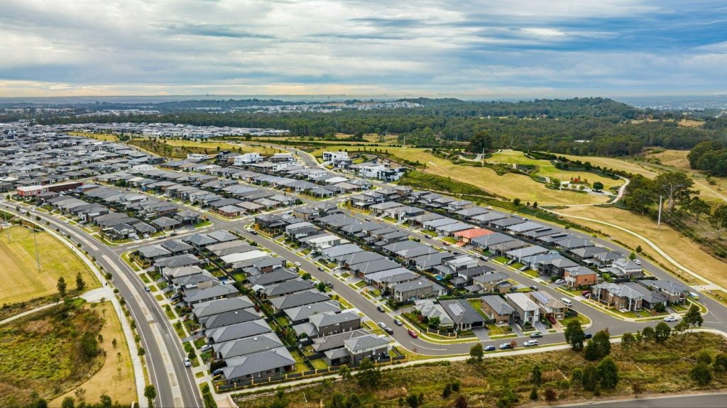 aerial view of a large, modern residential subdivision