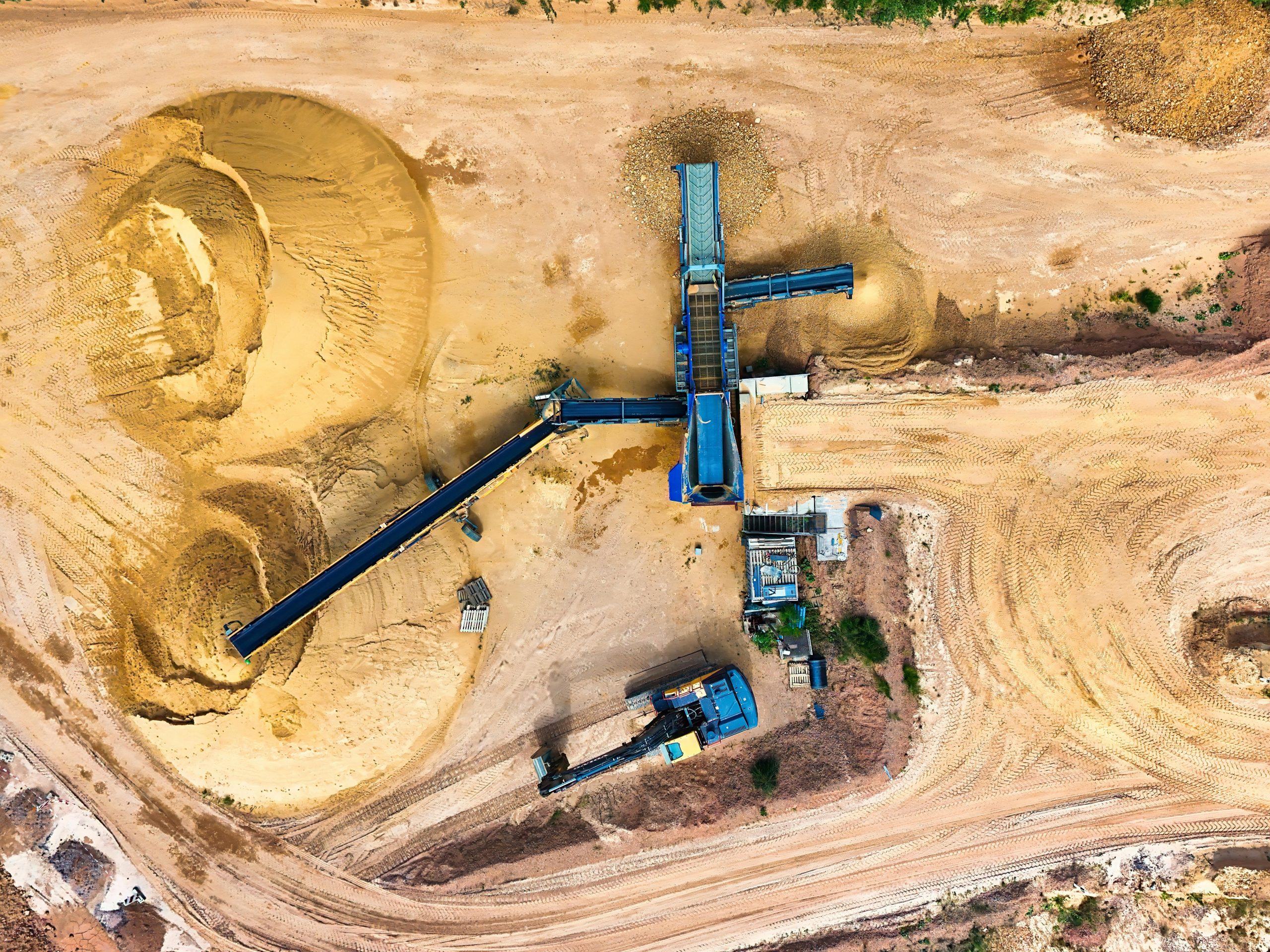 Aerial view of a sand quarry with machinery
