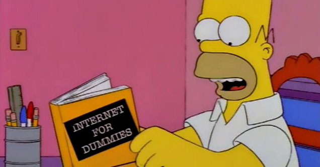 Happy International Internet Day - Homer Simpson reading 'Internet for Dummies'