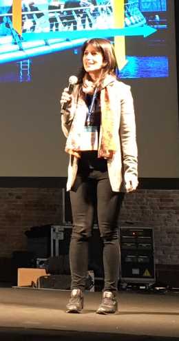 My friend and colleague, Erica, after winning her battle with a handheld microphone.