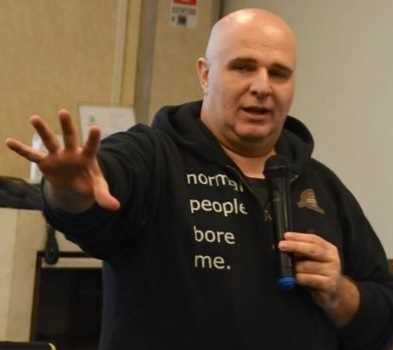 Lorenzo Barbieri presenting in front of a group.