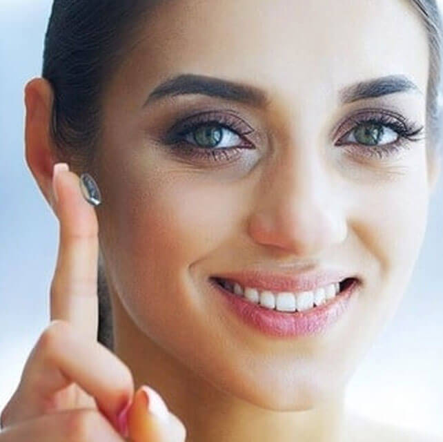 smiling girl wearing black frames