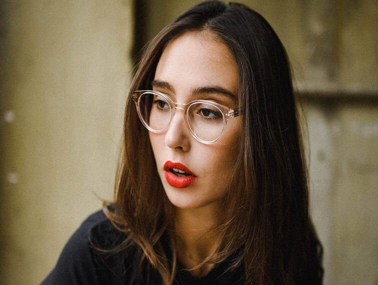 woman clear frames red lips 755x570